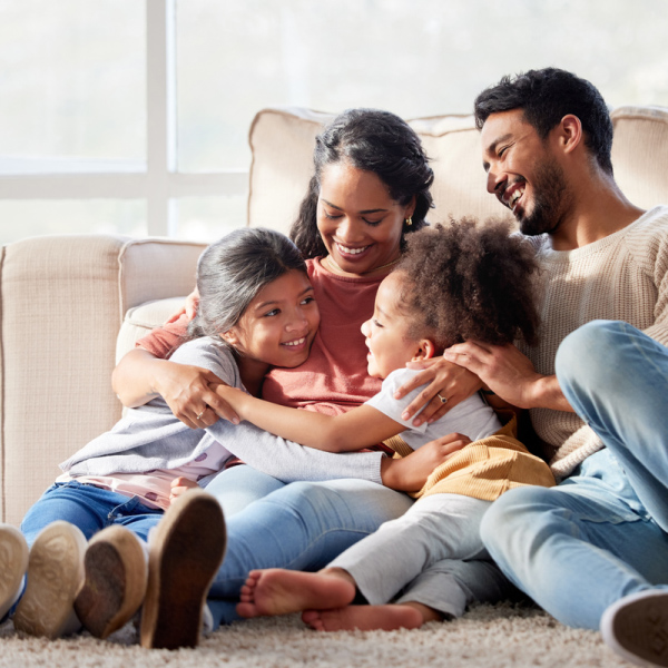 Happy Family in a comfortable, inulated home