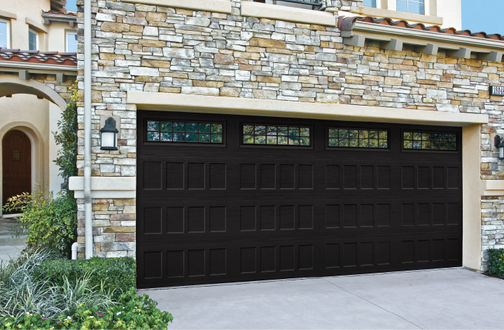 Recessed glazed black garage door