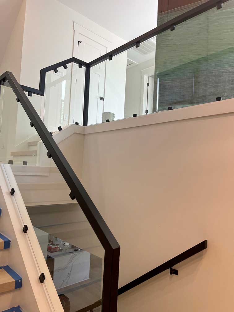 Custom glass railings on staircase in customer's home, Clarksville, TN.