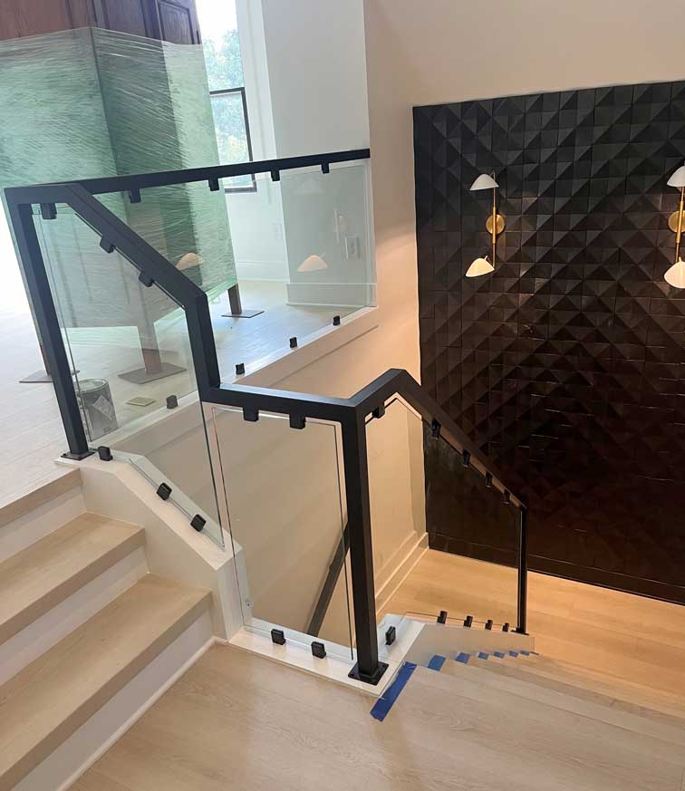 Custom glass railings on staircase in customer's home, Clarksville, TN.