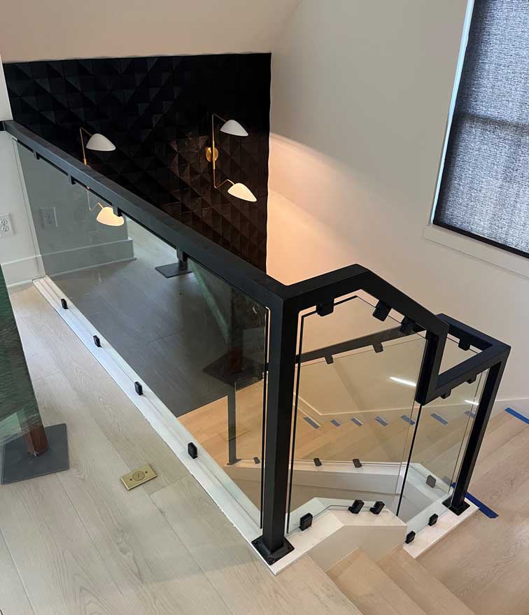 Custom glass railings on staircase in customer's home, Clarksville, TN.